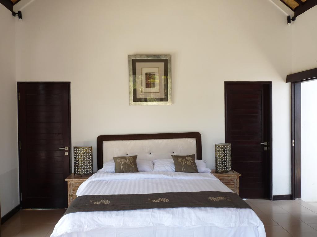 Taman Dewi Sri Villa Et Bungalow ペムテラン 部屋 写真