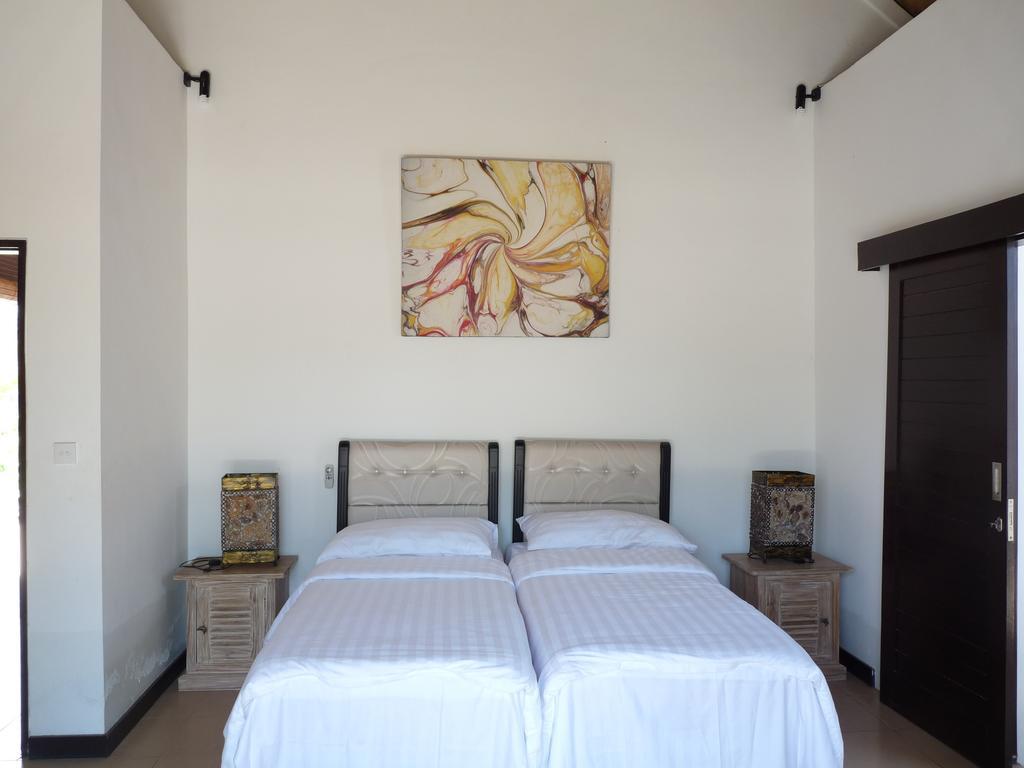 Taman Dewi Sri Villa Et Bungalow ペムテラン 部屋 写真