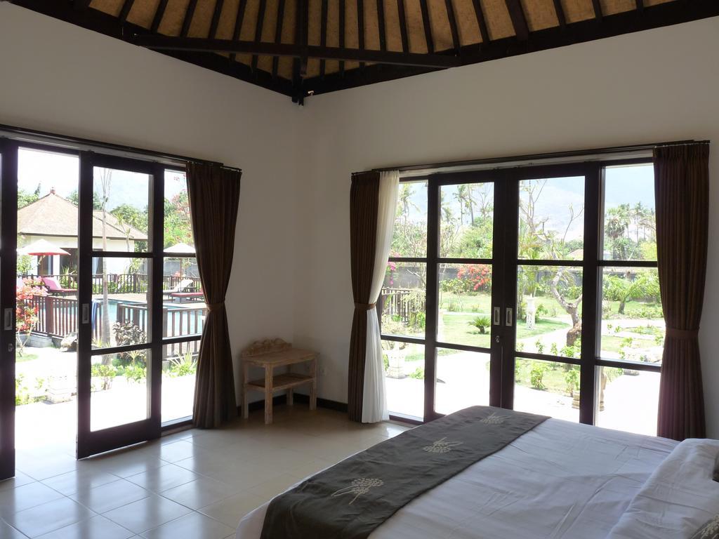 Taman Dewi Sri Villa Et Bungalow ペムテラン 部屋 写真