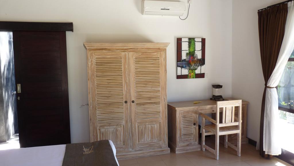 Taman Dewi Sri Villa Et Bungalow ペムテラン 部屋 写真