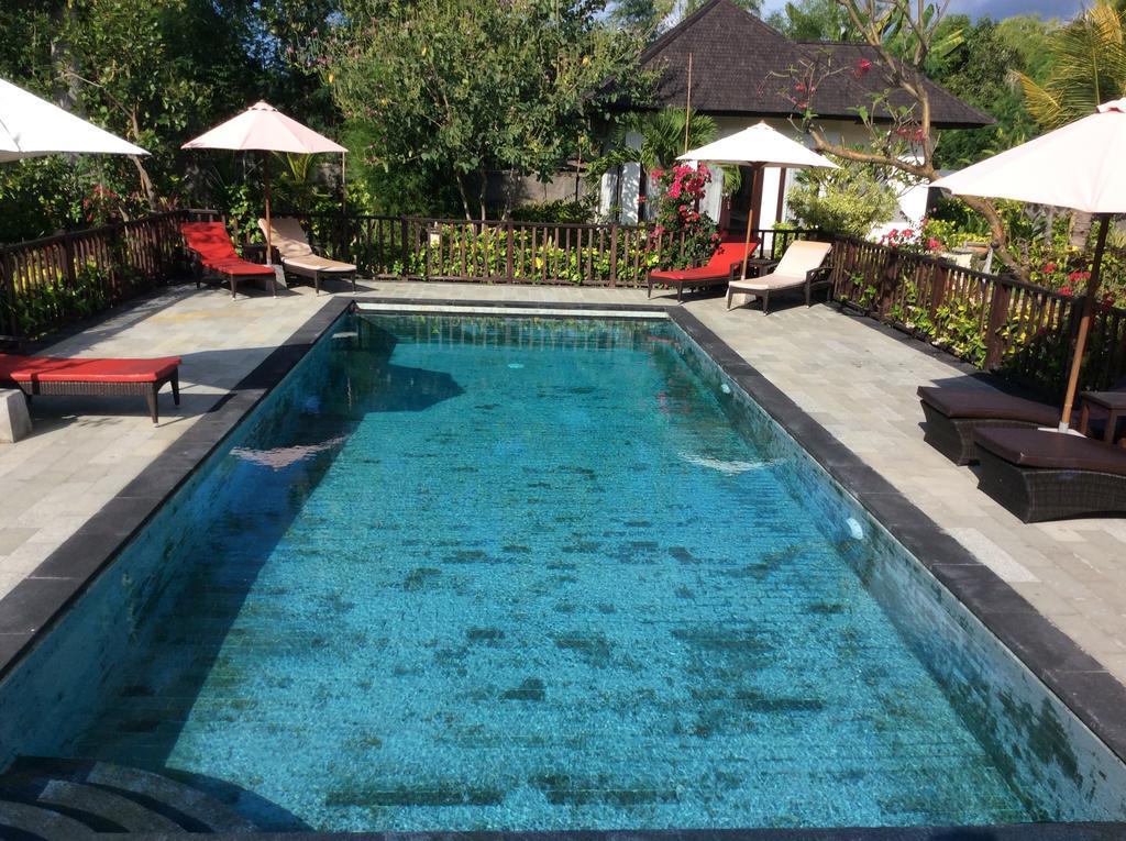 Taman Dewi Sri Villa Et Bungalow ペムテラン エクステリア 写真